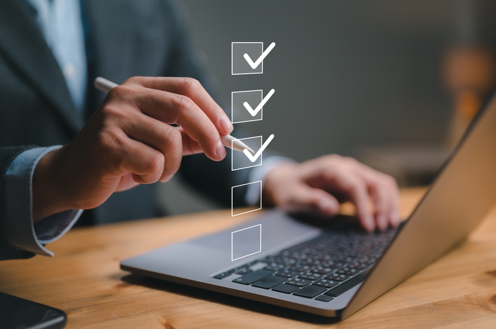 A man is currently doing some digital audit