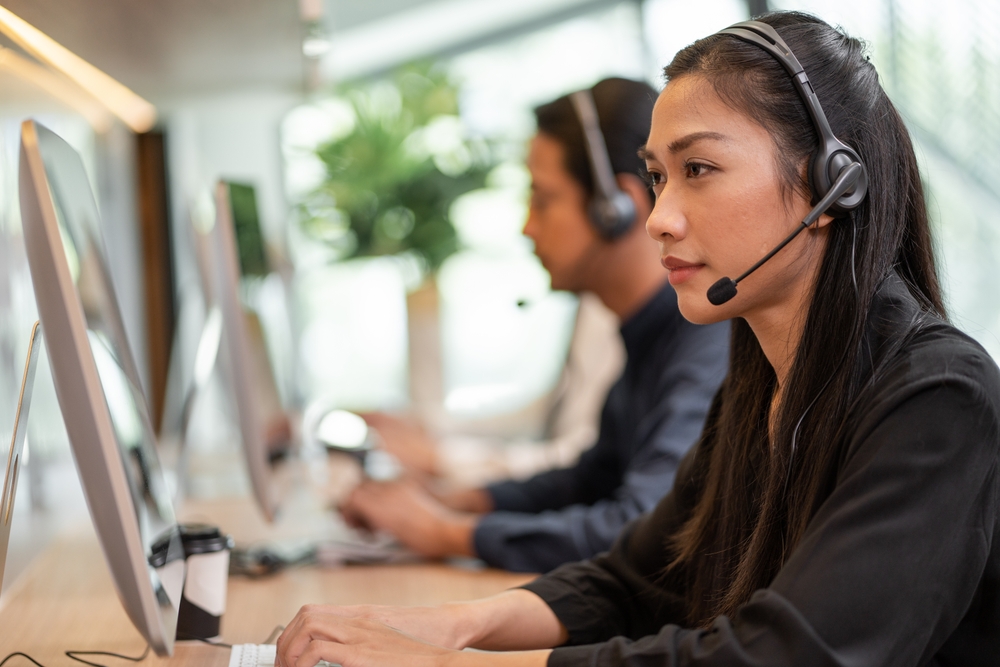 A lady is performing customer service call